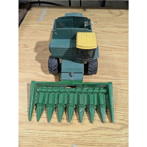 Toy john deere harvester, well used