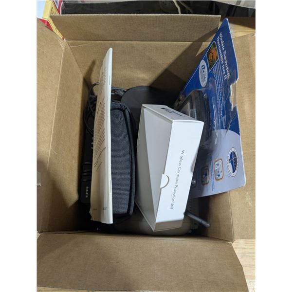 box of wireless tech, thermometers, gps, router, etc.