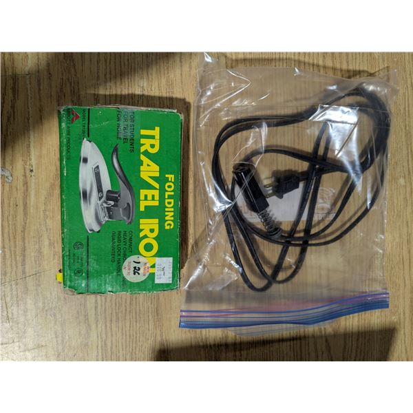 folding travel iron, with original packaging