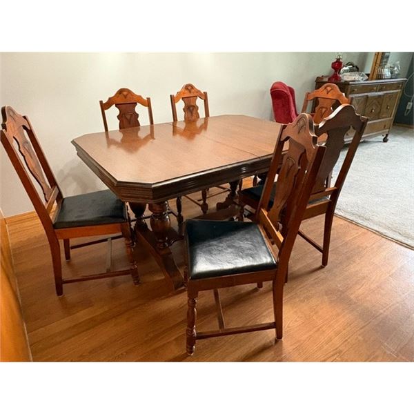 Solid wood dinning table and chairs- 54" by 40" by 30"H
