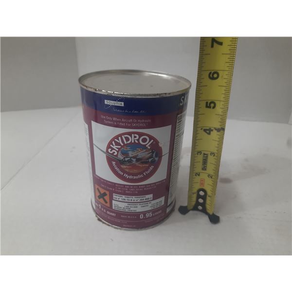 This is a 1-quart (0.95-liter) cylindrical metal container of Solutia brand aviation hydraulic fluid