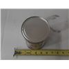 Image 2 : This is a 1-quart (0.95-liter) cylindrical metal container of Solutia brand aviation hydraulic fluid