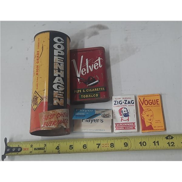 This collection features various vintage tobacco tins, including a tall Copenhagen Snuff tin and a r