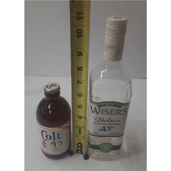 Vintage Colt 45 Malt Liquor bottle, commonly known as a "stubby" bottle (Full) and J.P. Wiser's Delu
