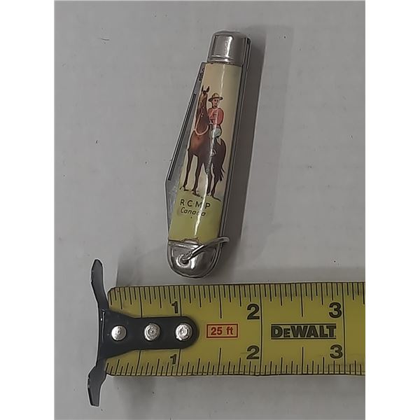 Vintage Richards Sheffield England pocket knife featuring a Royal Canadian Mounted Police (RCMP) hor