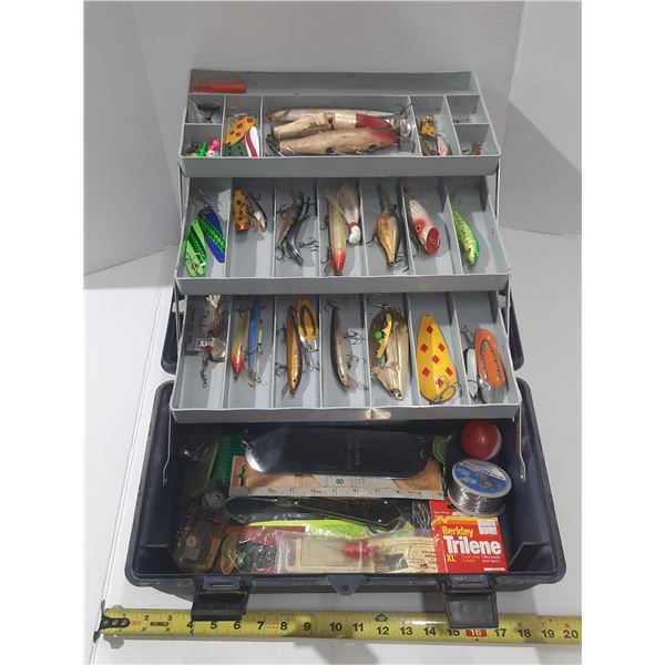 Vintage Flambeau tackle box contains a variety of vintage lures from brands like Rapala, Mann's, and