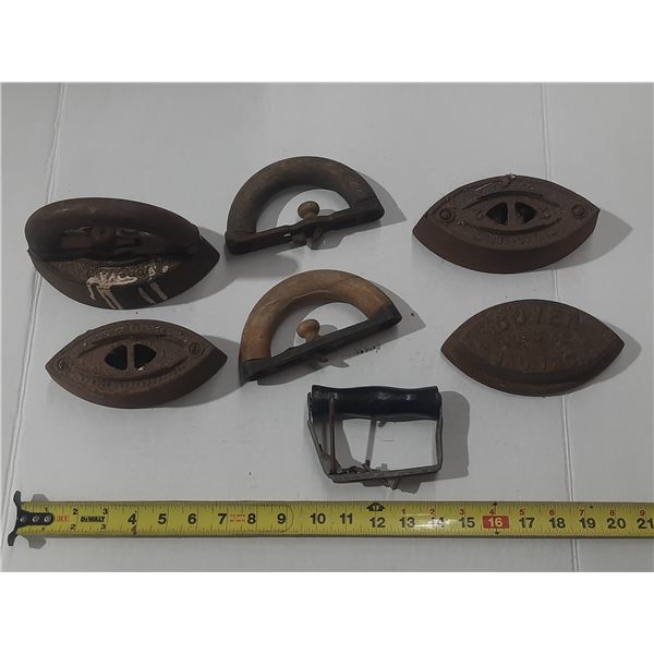 (4) Sad Irons with (4) Handles.