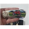 Image 3 : John Deere branded set includes a folding pocket knife with tractor artwork, a themed keychain, and 