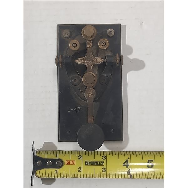 Vintage U.S. Army Signal Corps J-37 telegraph key mounted on a J-47 base.