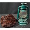 Image 1 : Green Metal Hurricane Lantern and Feathered Hat with Brown Plumage