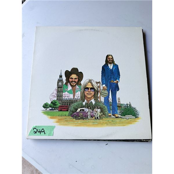 VINYL RECORD  ILLUSTRATED ALBUM COVER WITH THREE FIGURES AND CITY LANDMARKS