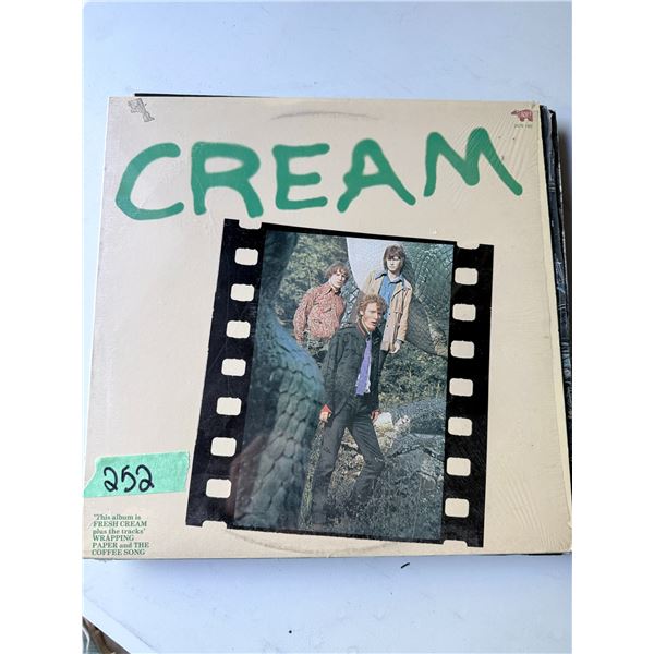 VINYL LP CREAM WRAPPED IN PLASTIC SHRINK WRAP