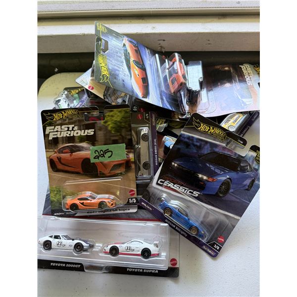 GROUP OF HOT WHEELS PREMIUM DIECAST VEHICLES IN PACKAGES