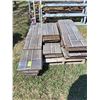 Image 1 : Sections of Tarred Shingles on Wood