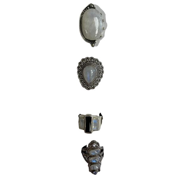 4 New Rings * all stamped .925 * (Moonstones, Onyx & Crystals) Longest ring  is 34 mm * Total weight