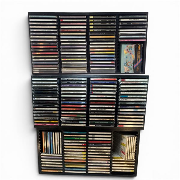 3 Racks Filled with CD's: Various Genres, Eras and Styles