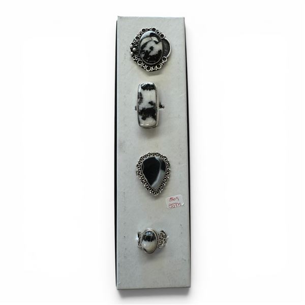 4 New Rings * all stamped .925 * (White Buffalo Turquoise - Variety of Shapes) Longest ring  is 35 m
