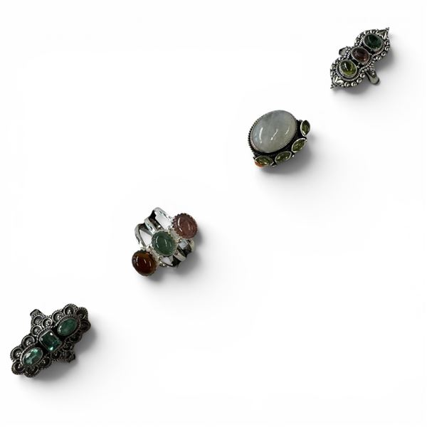 4 New Rings * all stamped .925 * (Peridot, Moonstone, Emerald Crystal, and Tourmaline) Longest ring