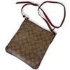 Image 1 : Coach Logo Cross Body PVC Leather Bag with Contrasting Red Strap & Red Interior (1.5" x 8" x 9" tall