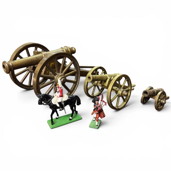 Three Brass Canons (Largest is 12" Long) & Two Britian's Metal Toy Soldiers