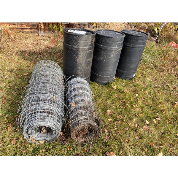 3- Black plastic barrels and 2- rolls of wire fencing