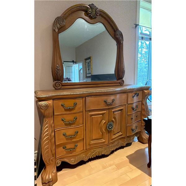 Wooden Dresser with Ornate Carvings and Matching Mirror