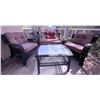 Image 1 : Four-Piece Black Wicker Patio Furniture Set with Cushions and Glass-Topped Table