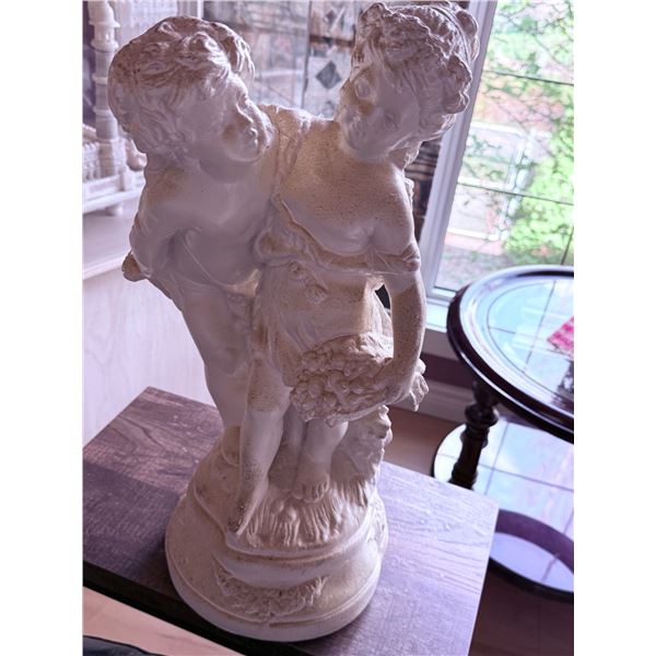 Plaster Figurine of a Romantic Couple on a Round Base