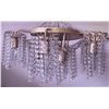 Image 1 : Brass and Crystal Eight-Light Chandelier with Cascading Beads