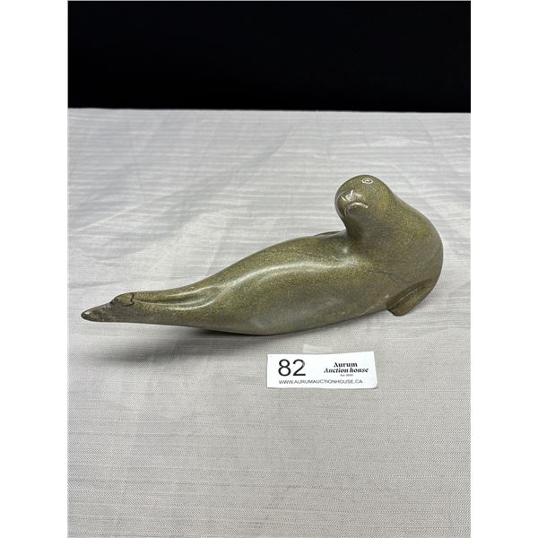 A Canadian Inuit Soapstone Carving of a Seal Signed