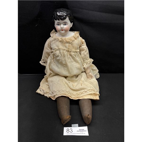 A Nice Early Porcelain Head Doll