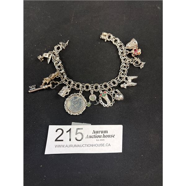 Very Nice Sterling Silver Bracelet with Charms, Not all Charms are Sterling