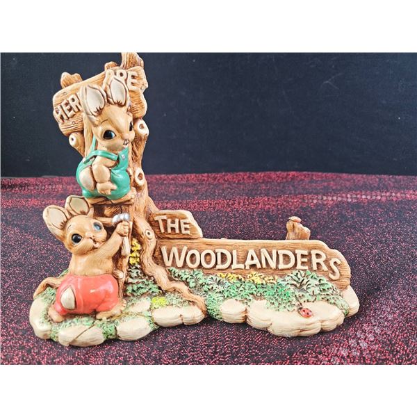 The Woodlanders Figurine Featuring Two Rabbits Climbing a Tree