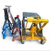 Image 1 : Performance 1500lb Hydraulic lift & Assorted Jack Stands