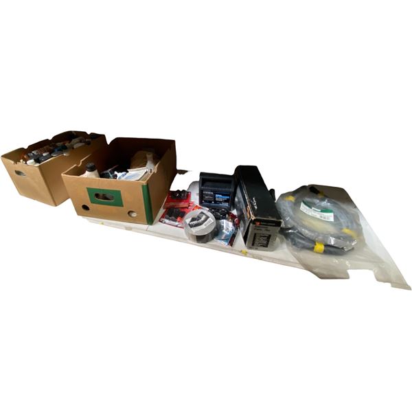 Shelf of Automotive Fluids, Car Care Products, Battery Charger, and Accessories