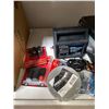 Image 4 : Shelf of Automotive Fluids, Car Care Products, Battery Charger, and Accessories