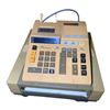 Image 1 : Canon FAX-220 Fax Machine and Canon Brownlee Canola P1016-D Calculator