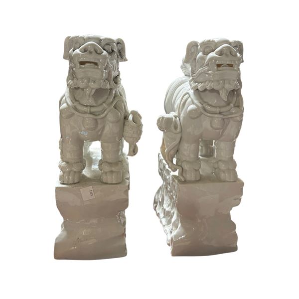 Pair of White Blanc de Chine Foo Dog Figurines