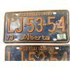 Image 2 : Pair of Vintage Alberta Wild Rose Country License Plates LJ 53 54