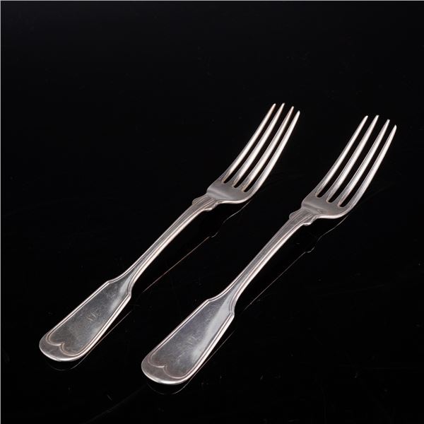 A Pair of Mitchell and Tyler Coin Silver Forks