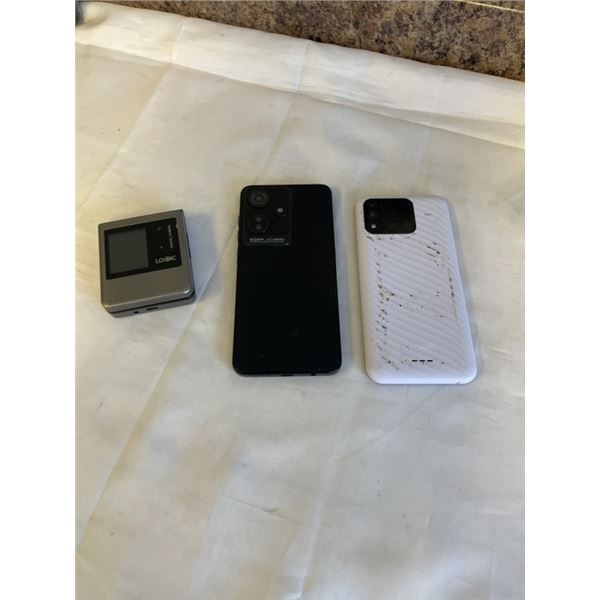 3 CELLPHONES. 1 MOXEE PHONE, 2 LOGIC PHONES, 1 IS A FLIP PHONE