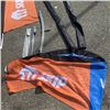 Image 2 : 2 WALMART SKIP THE DISH SWOOPER FLAGS WITH 2 GROUND HOLDER SPIKES AND STAND WITH TABLE COVER