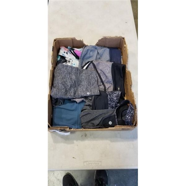TRAY OF LADIES LULULEMON CLOTHING