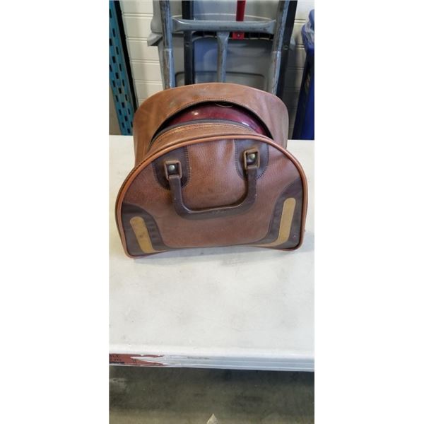 VINTAGE BOWLING BALL IN LEATHER BAG