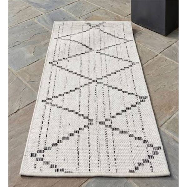 Rolled Area Rug with Geometric Pattern