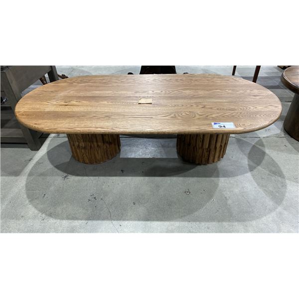 BROWN LIGHT WOOD OVAL COFFEE TABLE