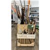 Image 1 : MOBILE WOOD ORGANIZER FULL OF ASSORTED CURTAIN RODS