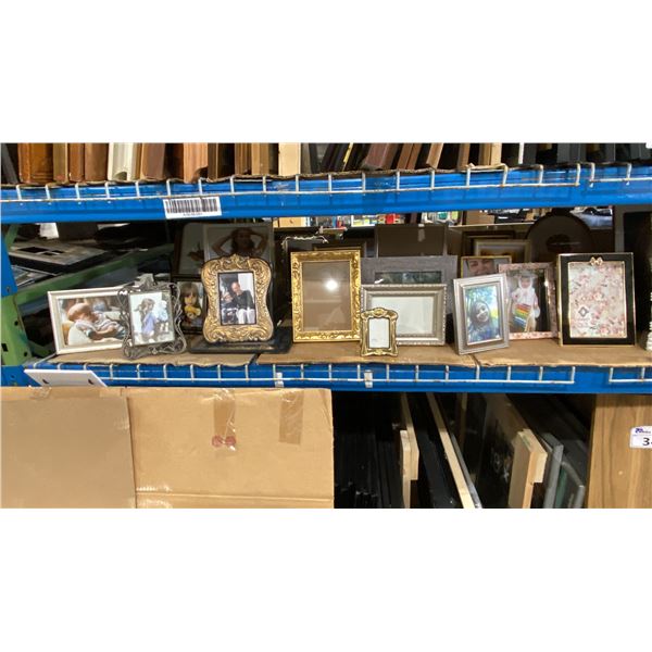 SHELF OF ASSORTED PICTURE FRAMES