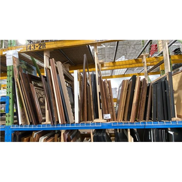 SHELF OF ASSORTED PICTURE FRAMES & ARTWORK