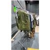 Image 1 : MOBILE CLOTHING RACK WITH ASSORTED SET DEC WARDROBE-ARMY CLOTHES, CARGO SHORTS, TSHIRTS